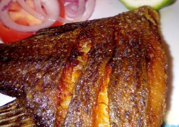 Wet fry fish served with Ugali and indigenous healthy veges